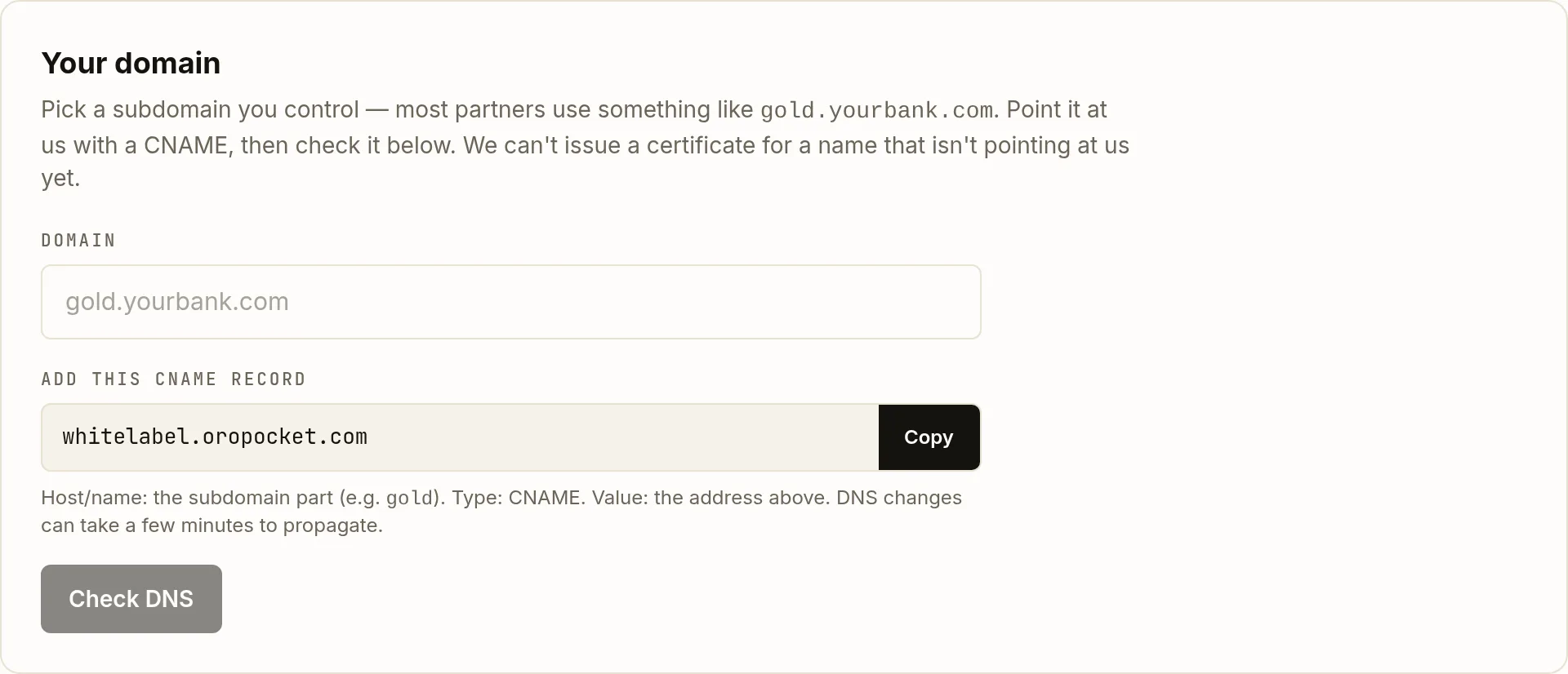The Your domain card on the OroPocket whitelabel page, with a Domain input field, a copyable CNAME target value, guidance on the record to create, and a Check DNS button.